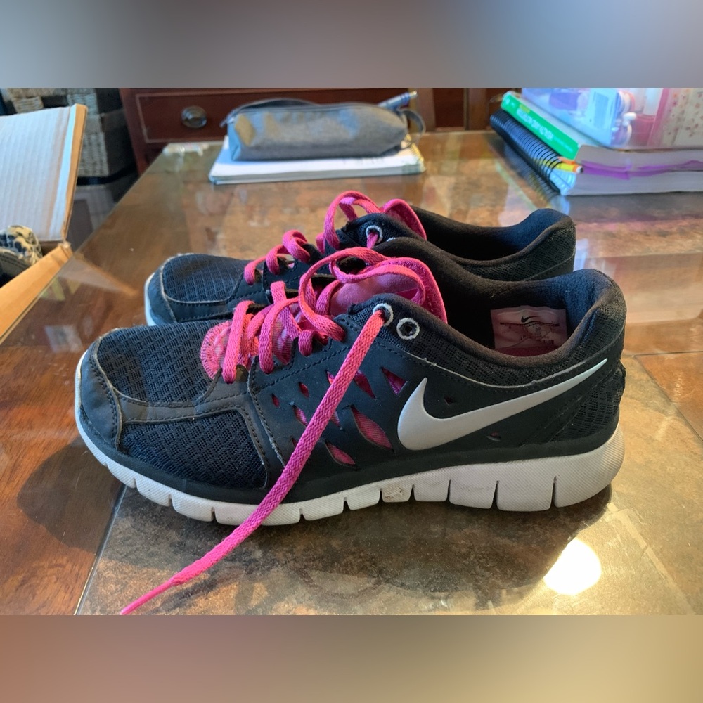 Women’s Nike Black and Pink running shoes size 8